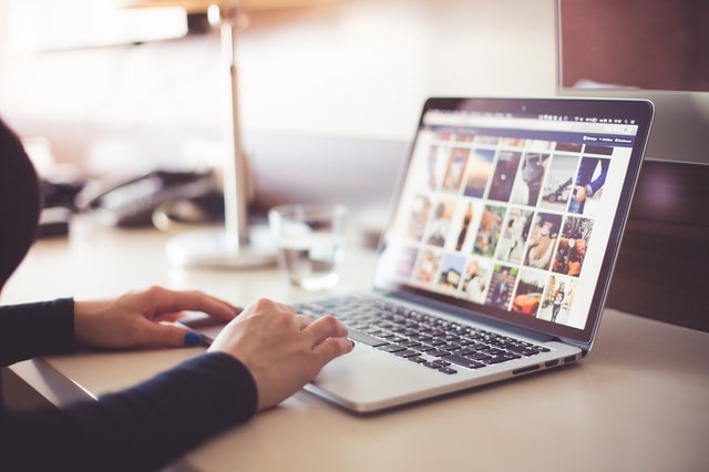 Girl infront of PC with images - Photo by picjumbo.com from Pexels